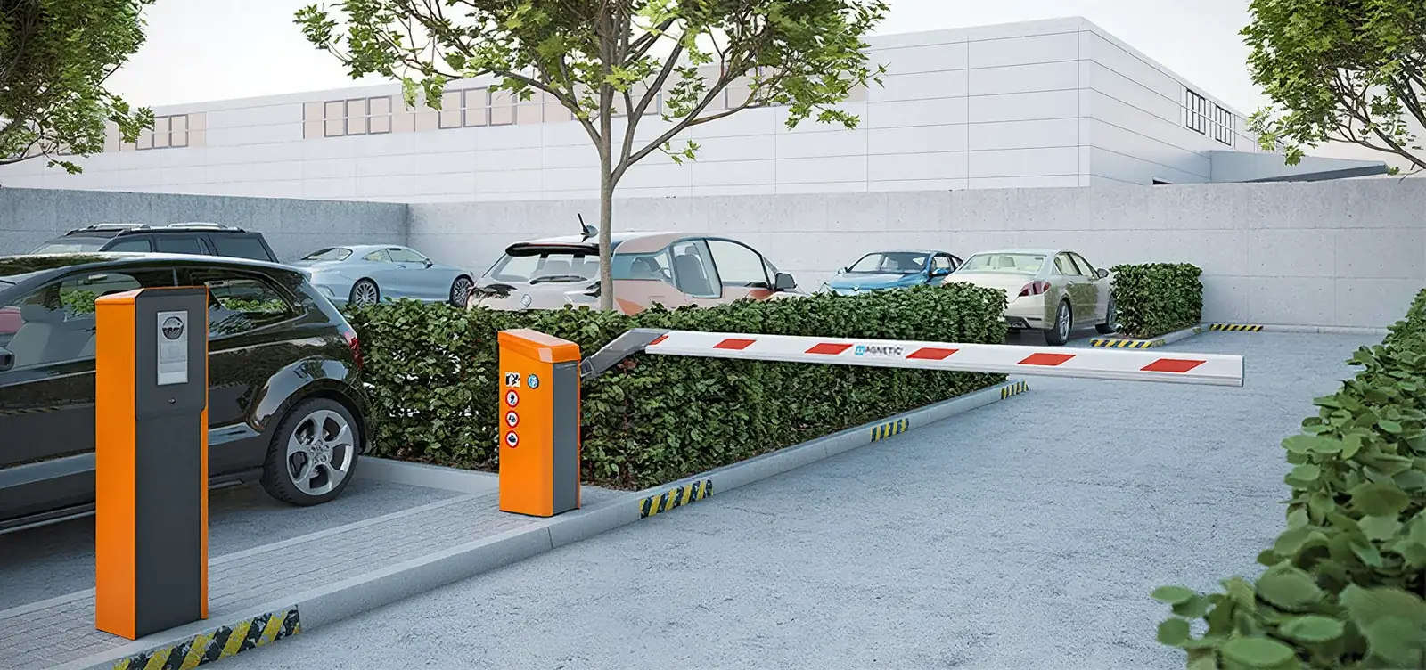 Magnetic Access barrier gate and ticket terminal at a landscaped parking lot entrance