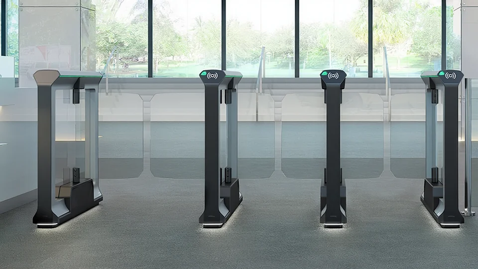 Magnetic optical speed gates with glass wings in a building lobby