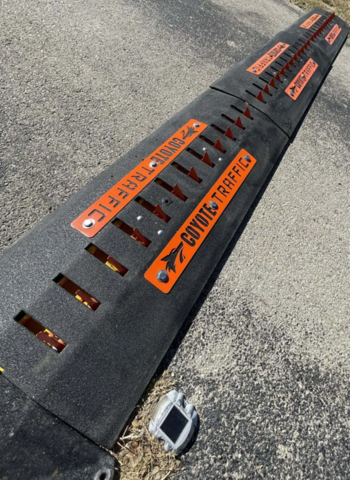 Surface-mount traffic spike module with a custom-branded faceplate