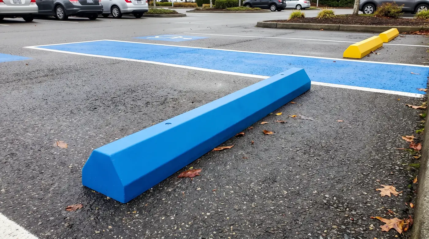 Blue wheel stop at an accessible parking stall