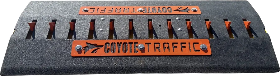 Coyote Traffic surface-mounted spike module with orange teeth and Coyote faceplates